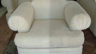 an armchair being cleaned at a client home in peoria arizona